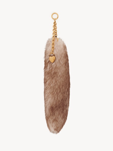The Treasure Tails charm in shearling