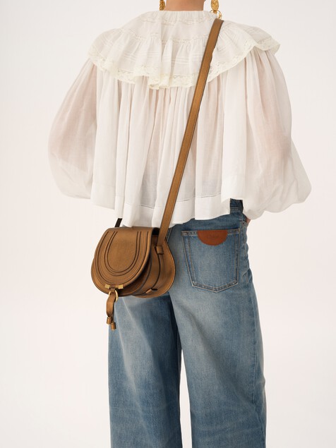 Small Marcie saddle bag in metallic leather
