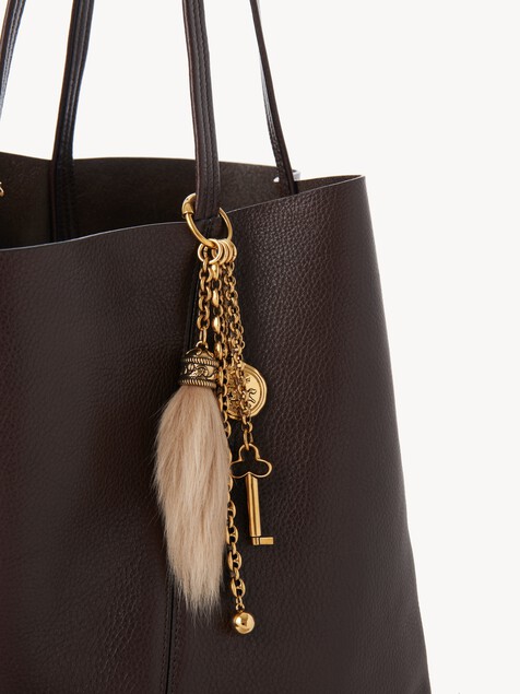 Chlo&eacute; Symbols bag charm in brass and shearling