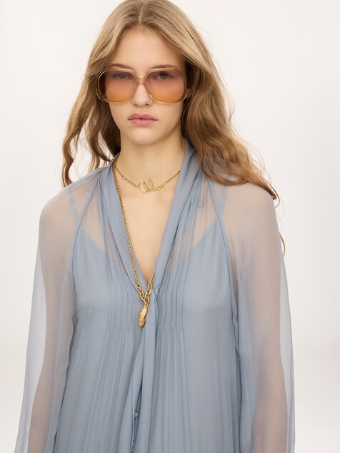 Fluid long dress in silk mousseline with lavalli&egrave;re tie