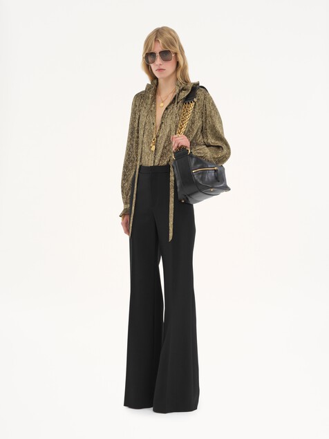 Flared tailored trousers in wool grain de poudre