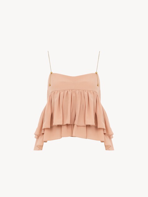 Sleeveless ruffled top in silk georgette