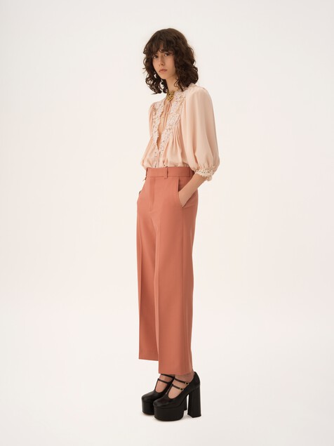Flared bootcut trousers in wool gabardine