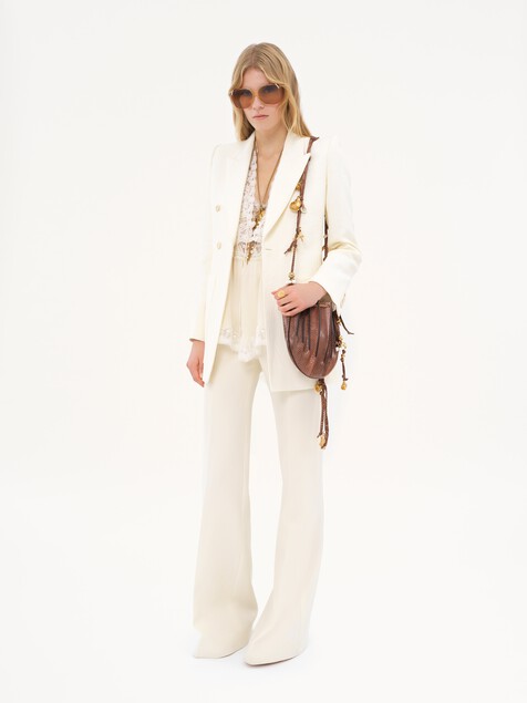 High-rise flared trousers in wool grain de poudre