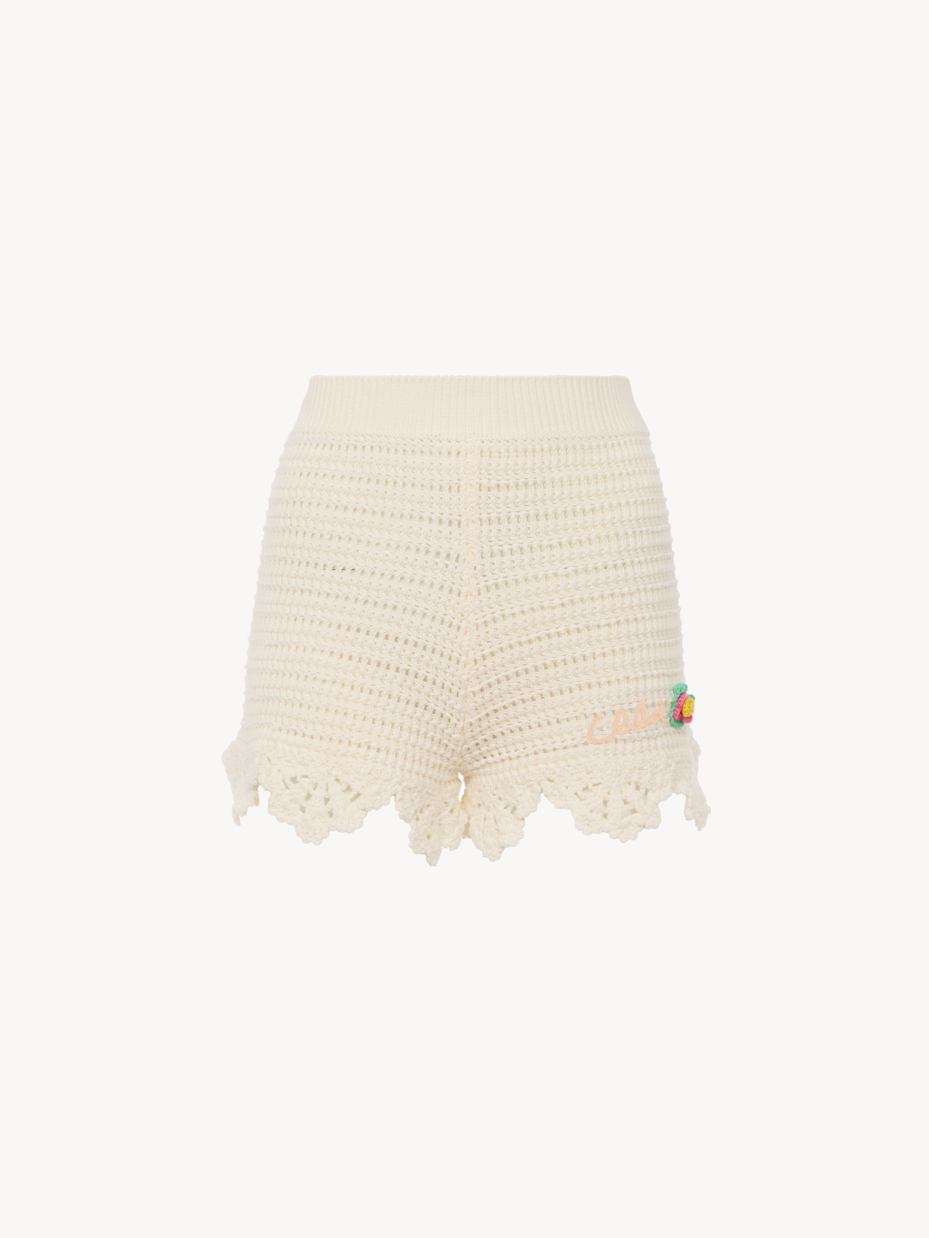 Sleeveless cropped top in crochet - NaN